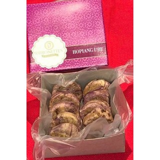 A box of Ribbonette's Hopiang Ube 10's, showcasing the delectable ube-filled hopia treats ready to be enjoyed